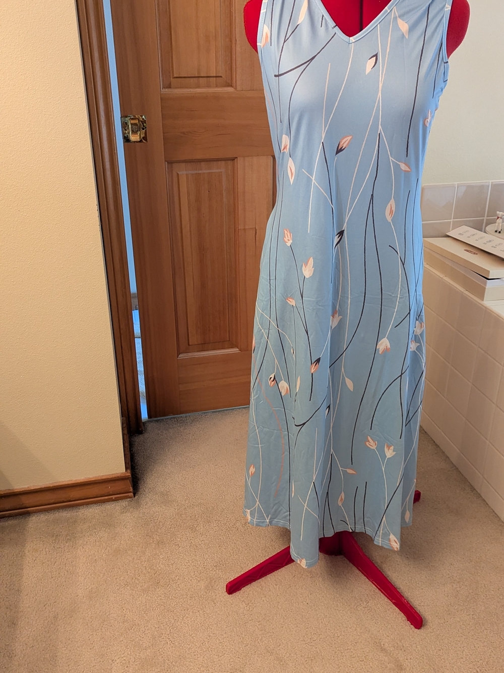 Sleeveless Light Blue Floral Midi Dress with V-Neck